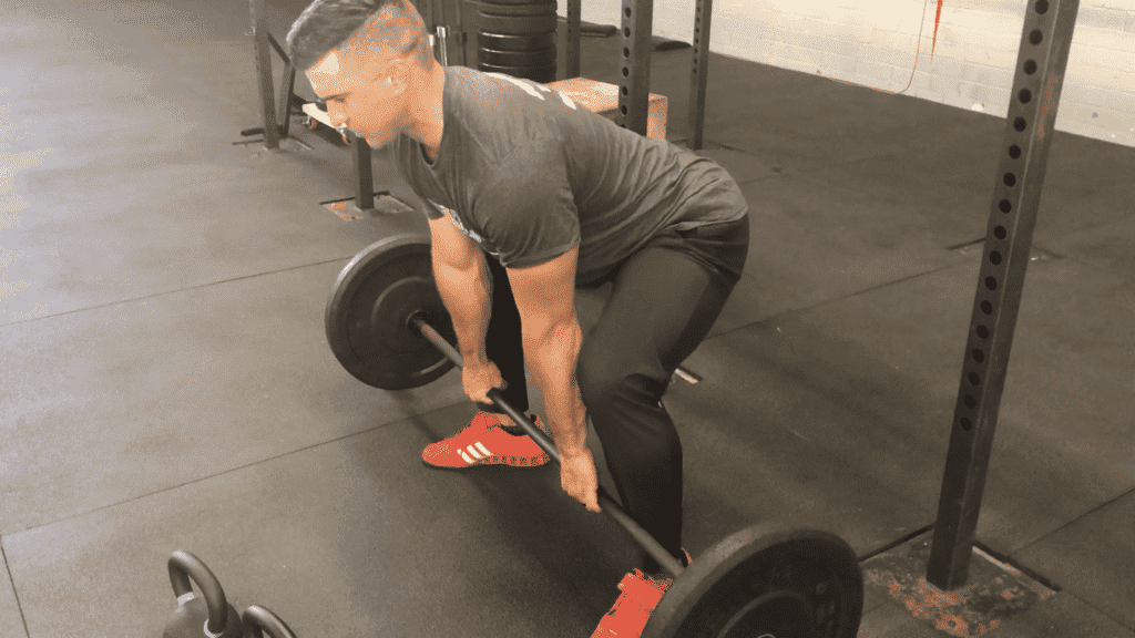 directory of fitness justin james doing squats with a barbell